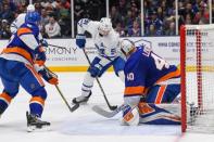 Apr 1, 2019; Uniondale, NY, USA; Toronto Maple Leafs center John Tavares (91) attempts a shot onNew York Islanders goaltender Robin Lehner (40) during the third period at Nassau Veterans Memorial Coliseum. Mandatory Credit: Dennis Schneidler-USA TODAY Sports