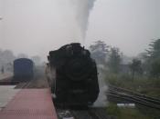 The 'X' class loco arrives on the platform before being coupled to the rake.