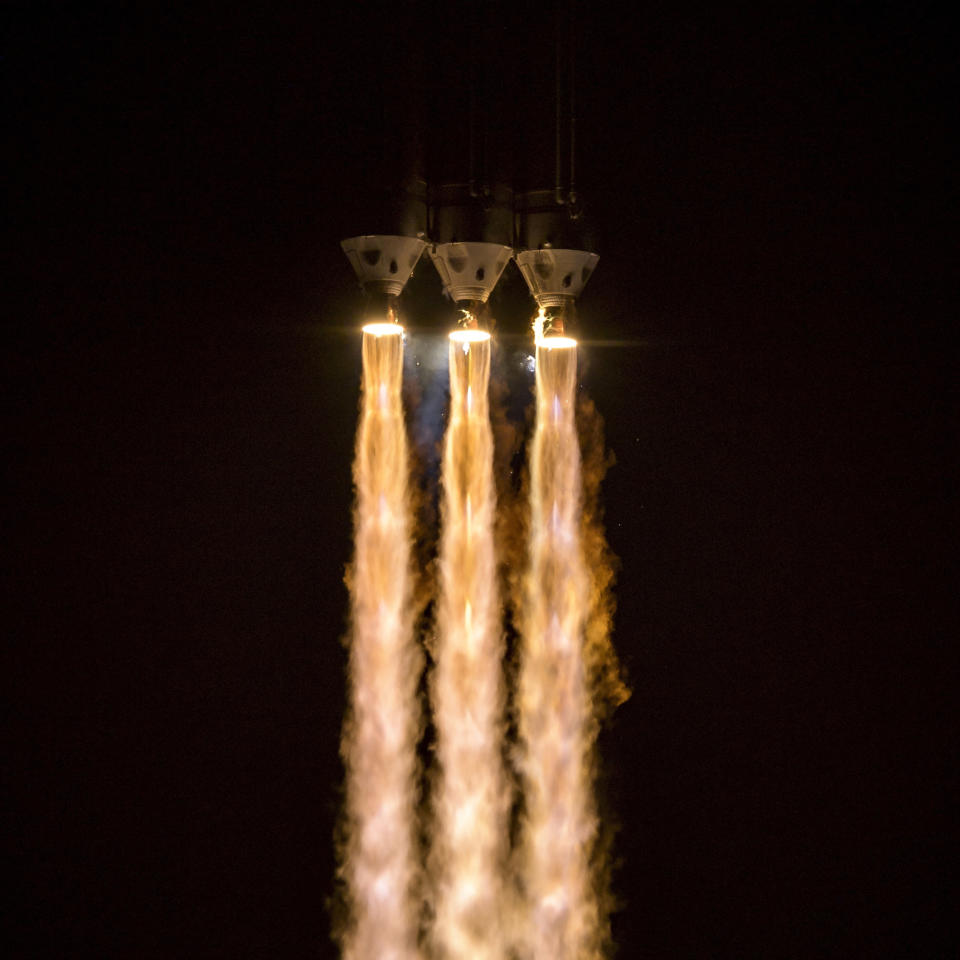 In this photo provided by NASA, The United Launch Alliance Delta IV Heavy rocket launches NASA's Parker Solar Probe to touch the Sun, Sunday, Aug. 12, 2018 from Launch Complex 37 at Cape Canaveral Air Force Station, Florida. (Bill Ingalls/NASA via AP)