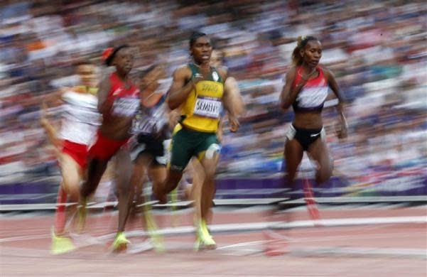 South Africa's Caster Semenya (C) runs with other competitors in her women's 800m semi-final during the London 2012 Olympic Games at the Olympic Stadium August 9, 2012.