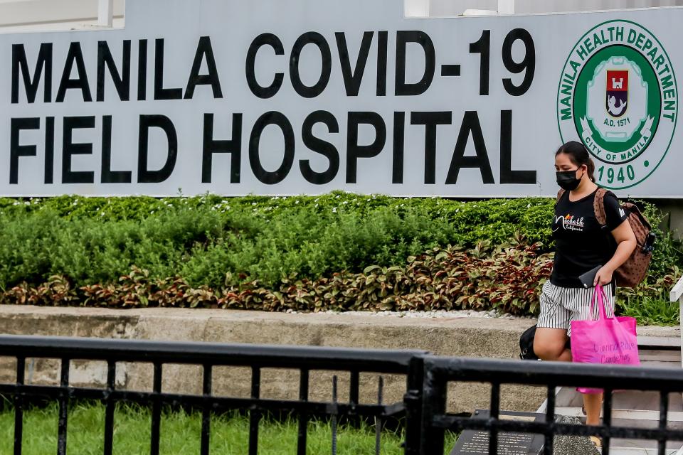 A woman wearing a mask is seen at a COVID-19 field hospital in Manila, the Philippines, Sept. 1, 2021. The Philippines crossed a grim milestone as COVID-19 caseload topped 2 million on Wednesday. (Photo: Rouelle Umali/Xinhua via Getty Images)