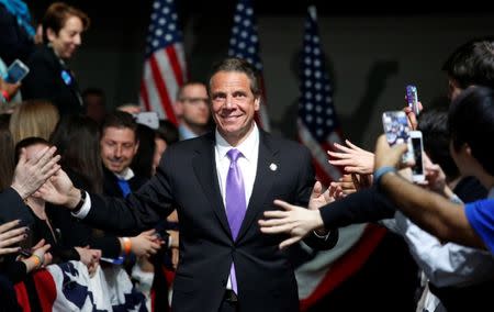 FILE PHOTO: New York State Governor Andrew Cuomo enters the room before the arrival of Democratic U.S. presidential candidate Hillary Clinton at her New York presidential primary night rally in the Manhattan borough of New York City, U.S., on April 19, 2016. REUTERS/Adrees Latif/File Photo