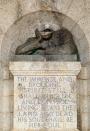 A damaged bust of Cecil John Rhodes, a controversial figure in the history of South Africa, is seen after the statue had been vandalised and had the head removed in Cape Town