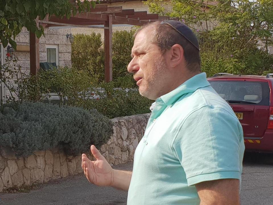 Silberstein stands outside his villa home (Nelofer Pazira)