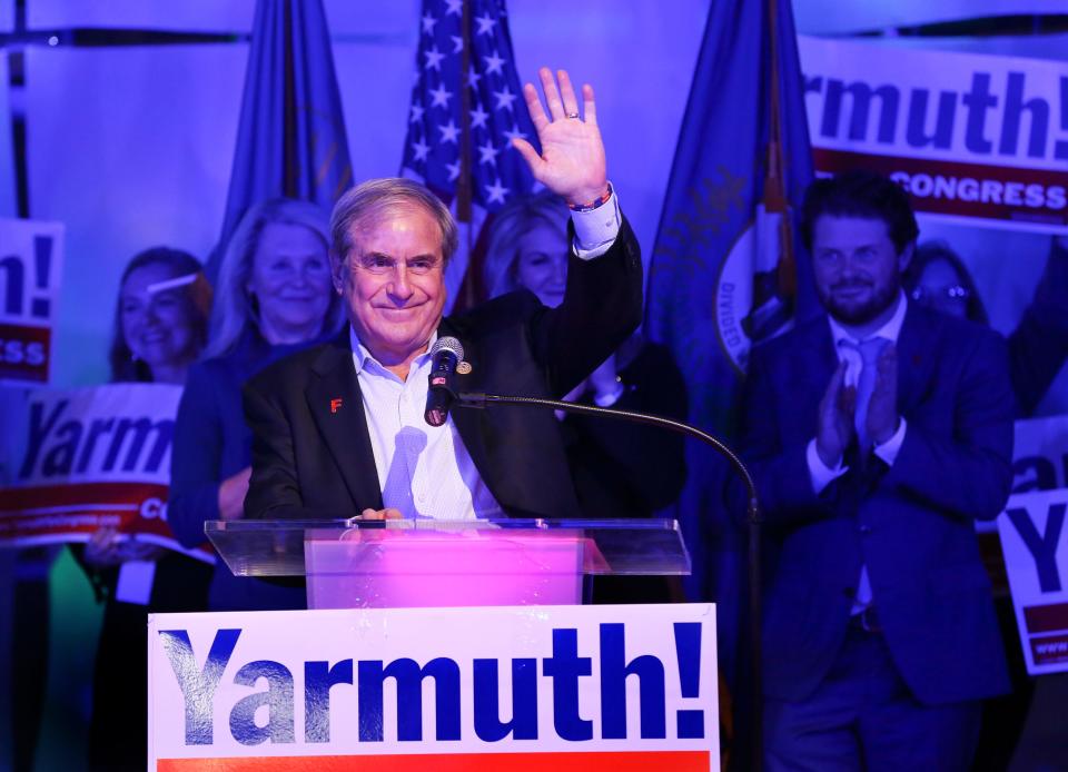 Congressman John Yarmuth waves to the crowd during his victory speech after winning another term to represent the 3rd District in Congress.  Nov. 6, 2018