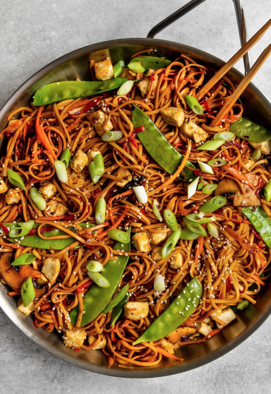 <p>Short Girl Tall Order</p><p>With a simple umami stir-fry sauce, tons of fresh vegetables, noodles, and crispy tofu, this vegan vegetable lo mein is truly a keeper!</p><p><strong>Get the recipe: <a href="https://shortgirltallorder.com/vegan-vegetable-lo-mein" rel="nofollow noopener" target="_blank" data-ylk="slk:Vegan Lo Mein with Tofu;elm:context_link;itc:0;sec:content-canvas" class="link "><em>Vegan Lo Mein with Tofu</em></a></strong></p>