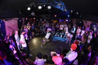 People watch breakers during a competition hosted by Supreme Beingz at the Mercury Lounge Friday, June 7, 2019, in New York. Many in the breaking community are eager for the art form to expand its audience after the International Olympic Committee announced that it would become an official sport at the Paris 2024 games. But that optimism is hardly unanimous. (AP Photo/Frank Franklin II)