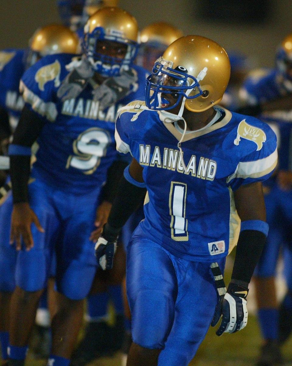 Mainland coach Travis Roland (1) was a key contributor to the 2003 championship team, setting a single-season, school record for tackles with 217. That mark still stands.