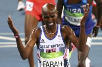 2016 Rio Olympics - Athletics - Final - Men's 5000m Final - Olympic Stadium - Rio de Janeiro, Brazil - 20/08/2016. Mo Farah (GBR) of Britain celebrates winning the final. REUTERS/David Gray