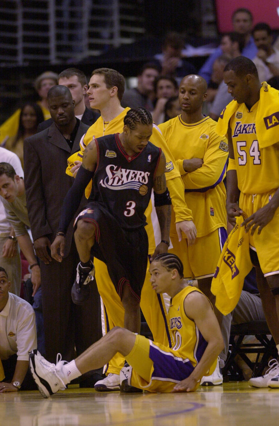 6 Jun 2001:  Allen Iverson #3 of the Philadelphia 76ers steps over Tyronn Lue #10 of the Los Angeles Lakers in game one of the NBA Finals at Staples Center in Los Angeles, California.  The 76ers won 107-101.  DIGITAL IMAGE.  Mandatory Credit: Otto Greule/Allsport.