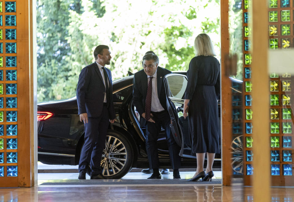 Andrej Plenkovic, centre, arrives at the presidential palace to meet President Zoran Milanovic, in Zagreb, Croatia, Friday, May 10, 2024. Croatian conservative leader and two-time prime minister, Andrej Plenkovic, on Friday was appointed prime minister-designate after he forged an alliance with an extreme party following an inconclusive election. (AP Photo)