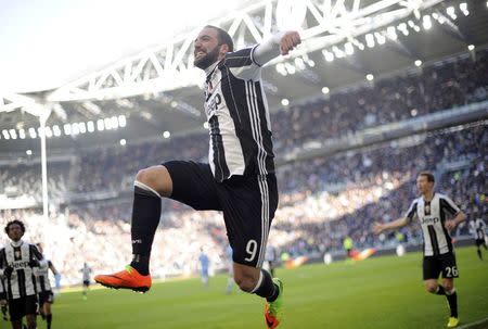 Football Soccer - Juventus v Lazio - Italian Serie A - Juventus stadium, Turin, Italy - 22/01/17 - Juventus' Gonzalo Higuain celebrates after scoring second goal. REUTERS/Giorgio Perottino