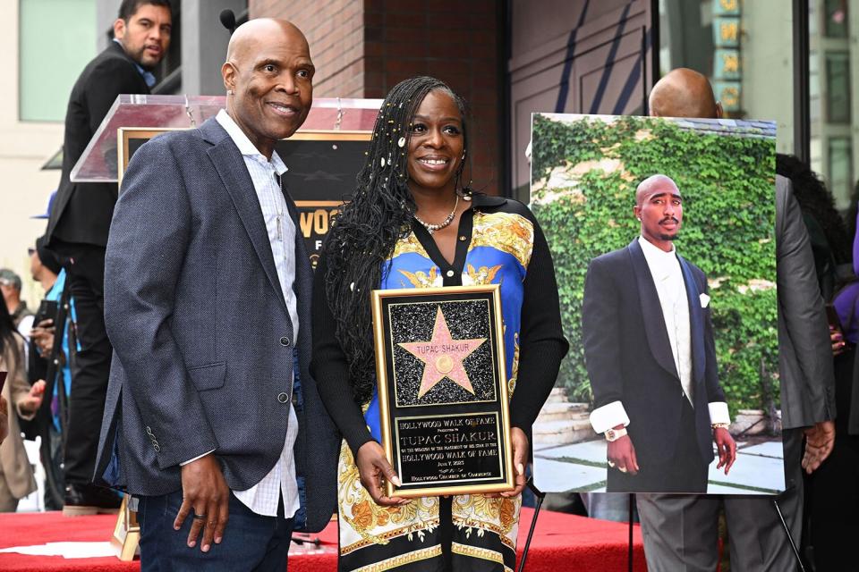 US radio personality Big Boy (L) and Sekyiwa Shakur, sister of US rapper Tupac Shakur, pose for a photo during Tupac's Hollywood Walk of Fame star ceremony in Hollywood, California, on June 7, 2023. Slain rap legend Tupac Shakur was honored with a star on Hollywood's Walk of Fame on Wednesday, almost three decades after the best-selling artist was gunned down in a drive-by shooting. The ceremony paid tribute to a rapper who died at age 25 after a brief but spectacular career, in which he went from backup dancer to self-styled gangsta and one of the most influential figures in hip-hop. (Photo by Robyn Beck / AFP) (Photo by ROBYN BECK/AFP via Getty Images)