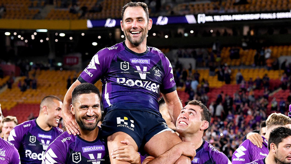 Cameron Smith is pictured being chaired off the ground after the Melbourne Storm's preliminary final win.