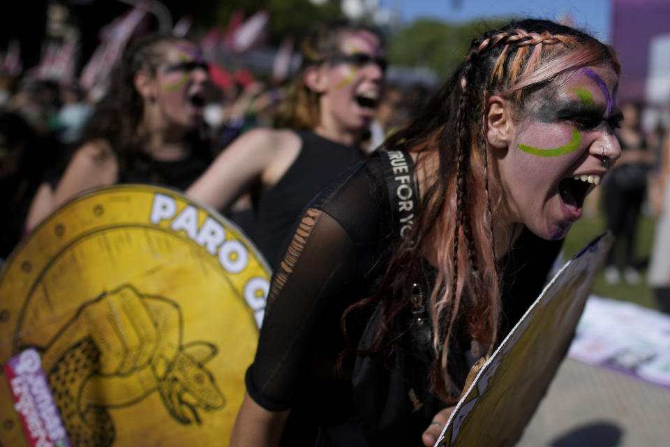 Women perform during the International Women's Day march outside Congress in Buenos Aires, Argentina, Friday, March 8, 2024. (AP Photo/Natacha Pisarenko)