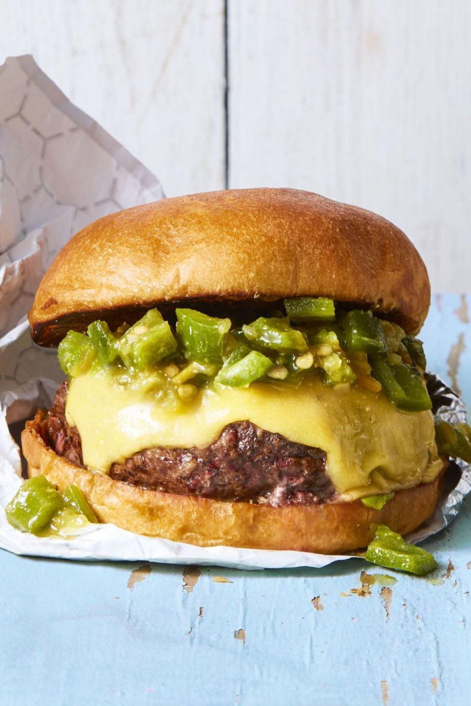 <p>Roasted green chiles, gooey cheddar cheese, and a brioche bun are a genius way to take your burger game to the next level.</p><p><em><a href="https://www.goodhousekeeping.com/food-recipes/a44680/green-chile-cheeseburger-recipe/" rel="nofollow noopener" target="_blank" data-ylk="slk:Get the recipe for Green Chile Cheeseburger »;elm:context_link;itc:0;sec:content-canvas" class="link ">Get the recipe for Green Chile Cheeseburger »</a></em> </p>