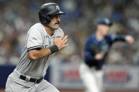 New York Yankees' Matt Carpenter runs to first base after grounding out against Tampa Bay Rays' Ryan Yarbrough during the third inning of a baseball game Thursday, May 26, 2022, in St. Petersburg, Fla. (AP Photo/Chris O'Meara)