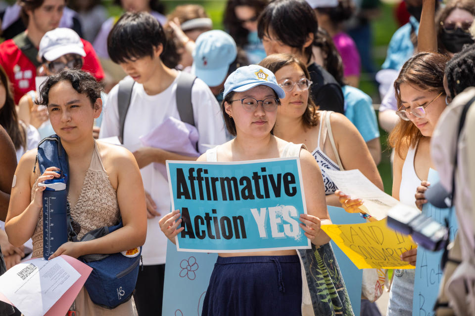 Students and others gather at Harvard University's Science Center Plaza to rally in support of affirmative action after the Supreme Court ruling on July 1 in Cambridge, Mass.