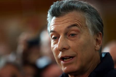 Argentina's President Mauricio Macri speaks to journalists after casting his vote in Buenos Aires, Argentina October 22, 2017. REUTERS/Marcos Brindicci