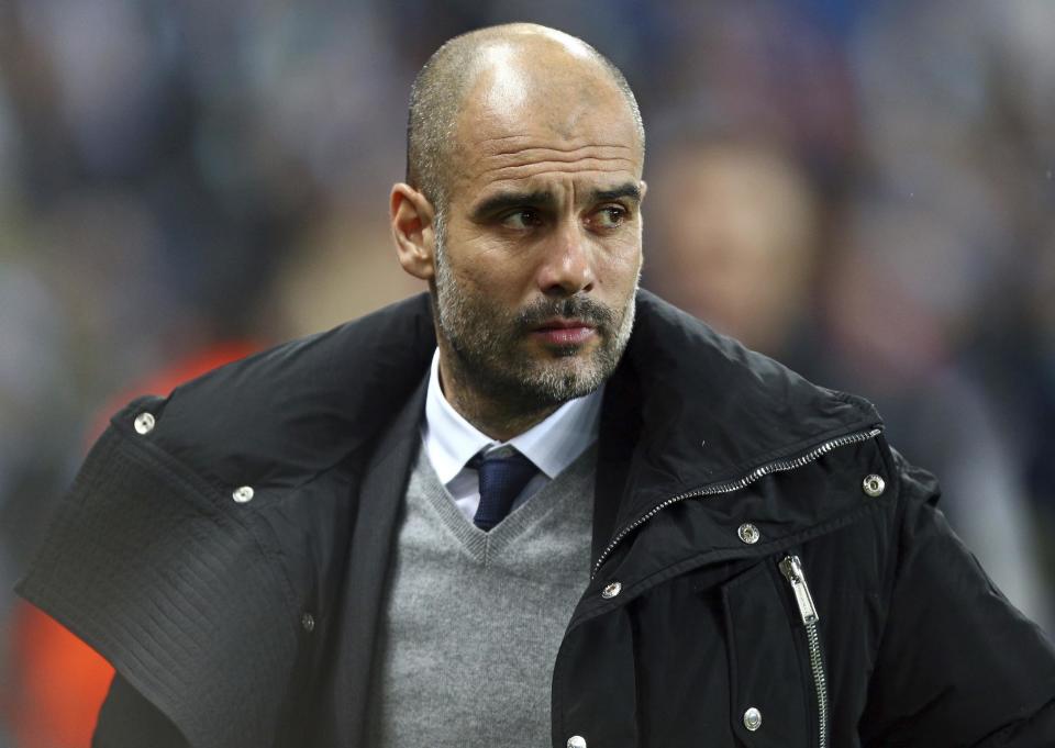 Manchester City's manager Pep Guardiola arrives for the Champions League round of 16 first leg soccer match between Manchester City and Monaco at the Etihad Stadium in Manchester, England, Tuesday Feb. 21, 2017. (AP Photo/Dave Thompson)