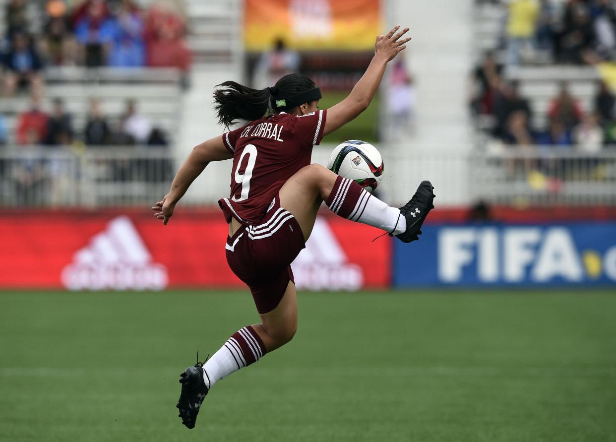 Mexico's forward Charlyn Corral controls the ball during a Group F match at the 2015 FIFA Women's World Cup between Colombia and Mexico at Moncton Stadium in Moncton, New Brunswick on June 9, 2015  AFP PHOTO / FRANCK FIFE (Photo by Franck FIFE / AFP)        (Photo credit should read FRANCK FIFE/AFP/Getty Images)