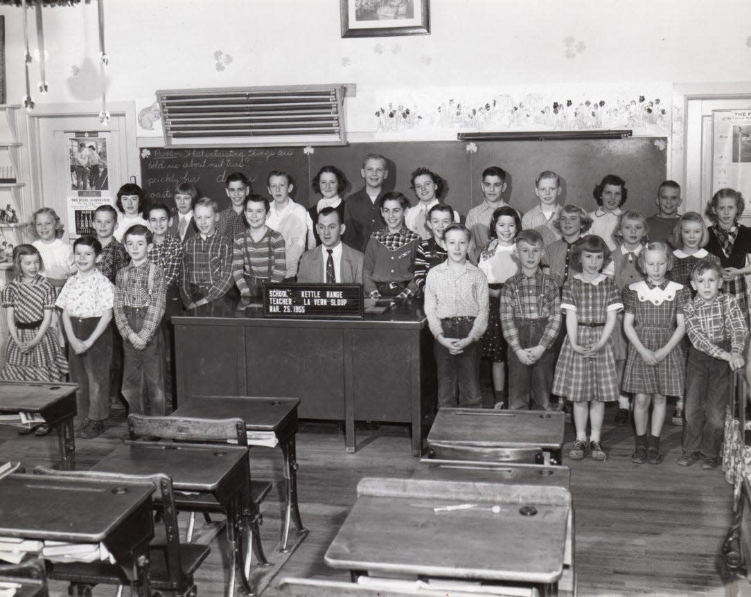 Students pose with their teacher, LaVern Sloup, at Kettle Range School in 1955, one of the last classes to attend the rural one-room school in Manitowoc County.