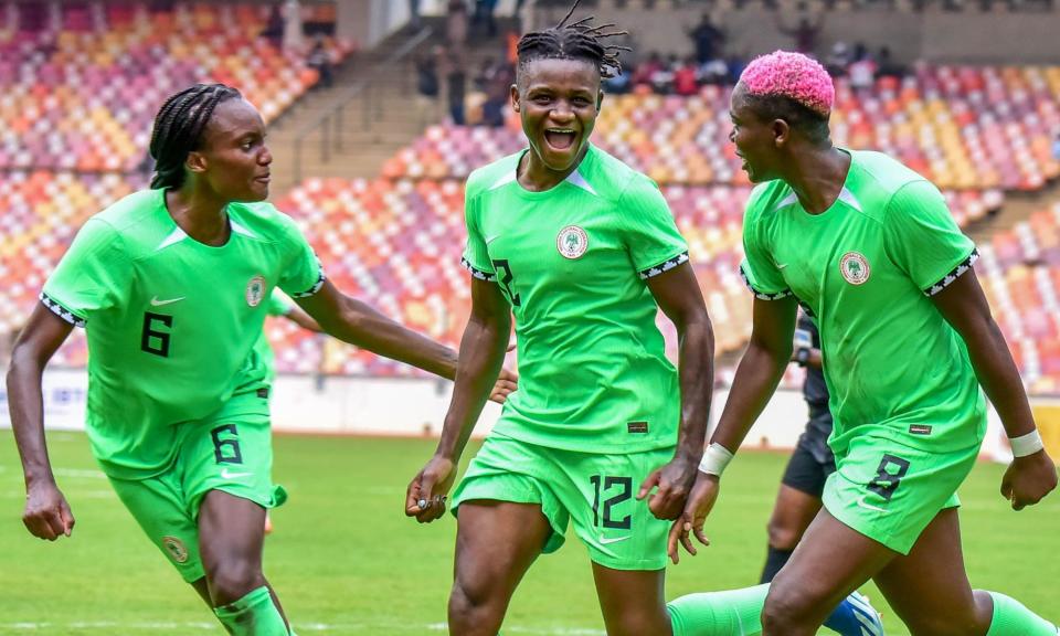 <span><a class="link " href="https://sports.yahoo.com/soccer/teams/nigeria-women/" data-i13n="sec:content-canvas;subsec:anchor_text;elm:context_link" data-ylk="slk:Nigeria;sec:content-canvas;subsec:anchor_text;elm:context_link;itc:0">Nigeria</a>’s <a class="link " href="https://sports.yahoo.com/soccer/players/1787716/" data-i13n="sec:content-canvas;subsec:anchor_text;elm:context_link" data-ylk="slk:Uchenna Kanu;sec:content-canvas;subsec:anchor_text;elm:context_link;itc:0">Uchenna Kanu</a> (centre) celebrates with <a class="link " href="https://sports.yahoo.com/soccer/players/3906917/" data-i13n="sec:content-canvas;subsec:anchor_text;elm:context_link" data-ylk="slk:Ifeoma Onumonu;sec:content-canvas;subsec:anchor_text;elm:context_link;itc:0">Ifeoma Onumonu</a> (left) and <a class="link " href="https://sports.yahoo.com/soccer/players/537171/" data-i13n="sec:content-canvas;subsec:anchor_text;elm:context_link" data-ylk="slk:Asisat Oshoala;sec:content-canvas;subsec:anchor_text;elm:context_link;itc:0">Asisat Oshoala</a> during October’s 4-0 win over Ethiopia.</span><span>Photograph: Shengolpixs/Alamy</span>