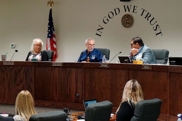 PHOTO: In this July 19, 2022, file photo, Nye County Commissioners Debra Strickland, Frank Carbone and Leo Blundo discuss appointing a new county clerk, in Pahrump, Nev. (Samuel Metz/AP, FILE)