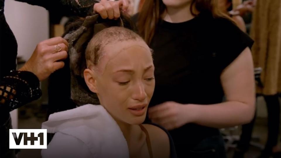 A hairdresser removing Jeana's wig