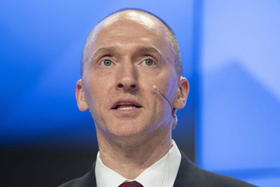 FILE - In this Dec. 12, 2016, file photo, Carter Page, a former foreign policy adviser of U.S. President-elect Donald Trump, speaks at a news conference at RIA Novosti news agency in Moscow, Russia. A published report says the FBI obtained a court order to monitor communications of an adviser to then-candidate Donald Trump last summer. The Washington Post reported April 11, 2017 the application to a special court to monitor Carter Page was part of the investigation into potential links between the Republican’s presidential campaign and Russia. The newspaper said its report was based on unnamed law enforcement and other U.S. officials. (AP Photo/Pavel Golovkin, file)