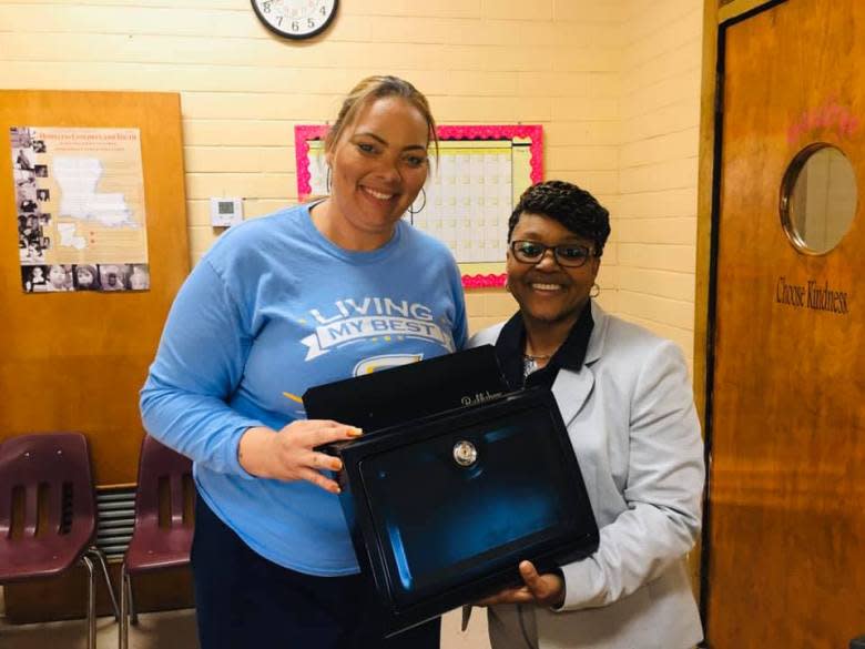 Shauna Sias (left) stands with Monica Fabre, a former principal in St. Landry Parish. Sias says she focuses a lot of her activism on young people. “With a young tree, you can influence how it grows,” she says. (Courtesy of Shauna Sias)