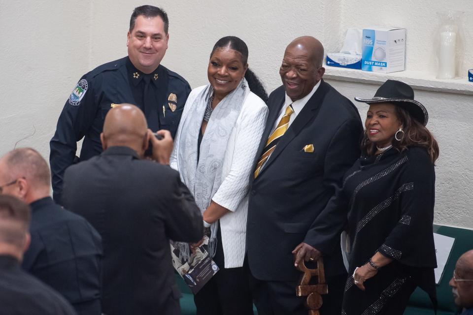 From left, Knoxville Police Chief Paul Noel, Beck Cultural Exchange Center President Rev. Renee Kesler, the Rev. Harold Middlebrook and former Knox County Commissioner Diane Jordan take a photo together Feb. 28 at Tabernacle Missionary Baptist Church before a funeral service celebrating the life of renowned civil rights leader Robert Booker.