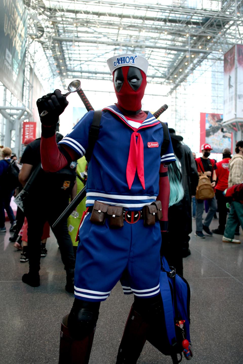 A cosplayer dressed as a Deadpool and "Stranger Things" mashup at New York Comic Con 2022.