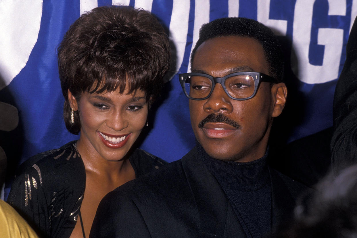Singer Whitney Houston and comedian/actor Eddie Murphy attend the United Negro College Fund's 10th Annual "Lou Rawls Parade of Stars" Telethon Kick-Off Party on November 15, 1989 at L'Ermitage in Beverly Hills, California. (Photo by Ron Galella, Ltd./Ron Galella Collection via Getty Images)