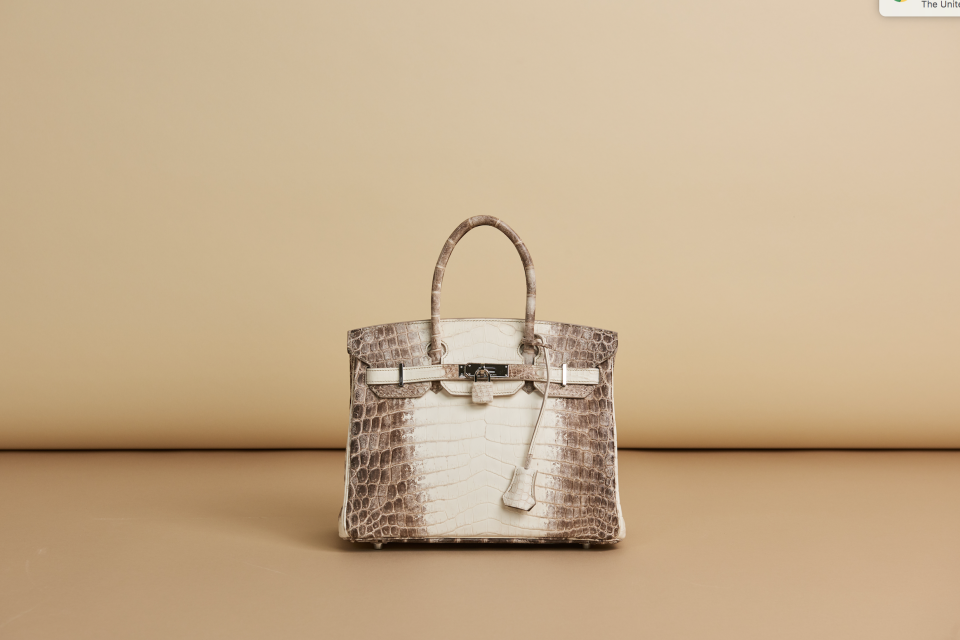 Yours for a steal at Rebag: a <span>rare albino crocodile, diamond encrusted Hermes Himalayan Birkin bag</span>