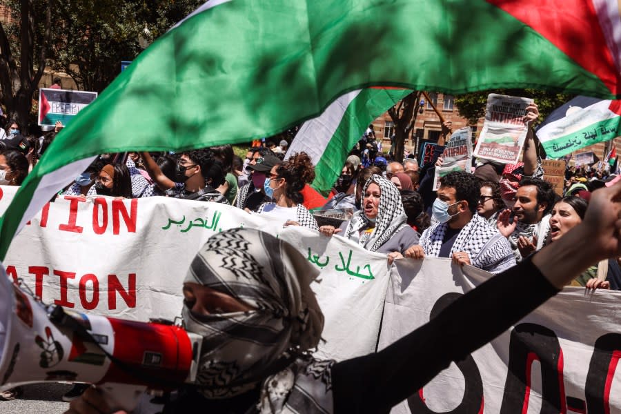 Los Angeles, CA – April 28: Pro-Israeli and Palestinian demonstrators clash in a demonstration, nearby where pro-Palestinian students have maintained a tent encampment for days at UCLA on Sunday, April 28, 2024 in Los Angeles, CA. (Dania Maxwell / Los Angeles Times via Getty Images)