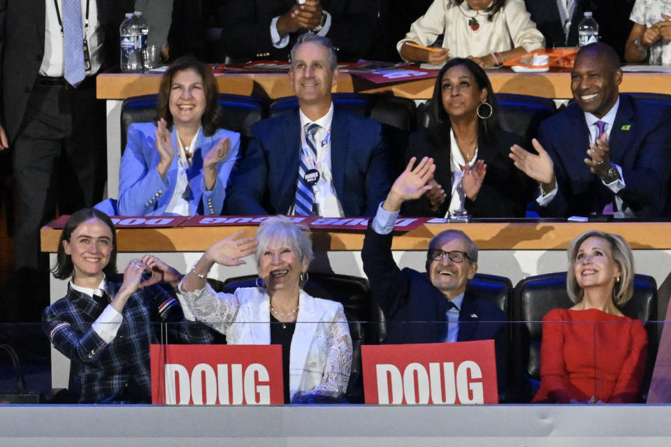 Ella Emhoff followed her father’s speech while sitting next to his parents Barbara and Michael Emhoff. 