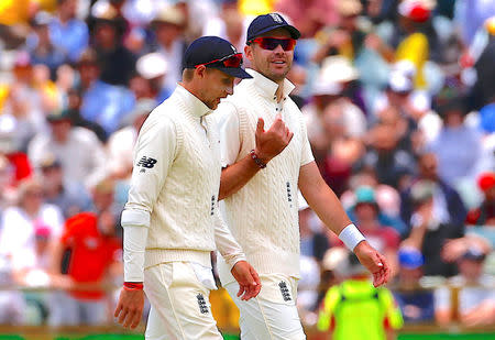 Cricket - Ashes test match - Australia v England - WACA Ground, Perth, Australia, December 17, 2017. England's captain Joe Root talks with teammate James Anderson during the fourth day of the third Ashes cricket test match. REUTERS/David Gray