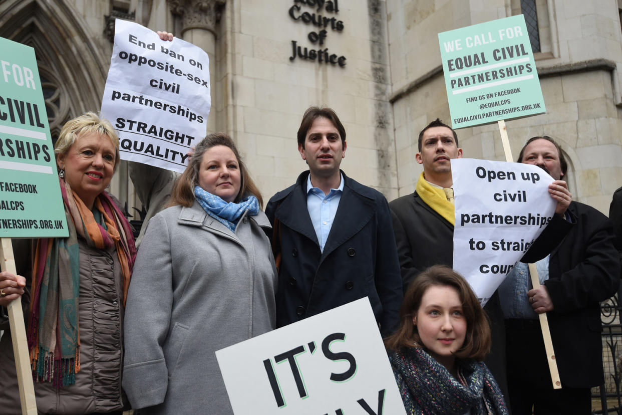 Legal row: Rebecca Steinfeld and Charles Keidan with supporters outside the Royal Courts of Justice in London: Charlotte Ball/PA