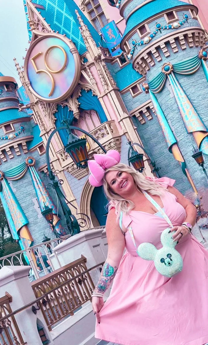 Jessica Fain at Disney World with a bedazzled popcorn bucket.