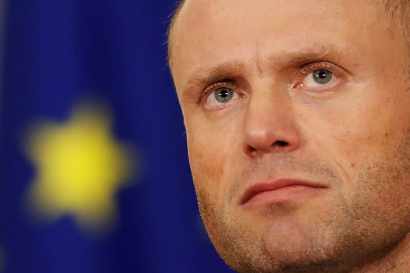 FILE PHOTO: Maltese Prime Minister Joseph Muscat addresses a press conference after an urgent Cabinet meeting at the Auberge de Castille in Valletta