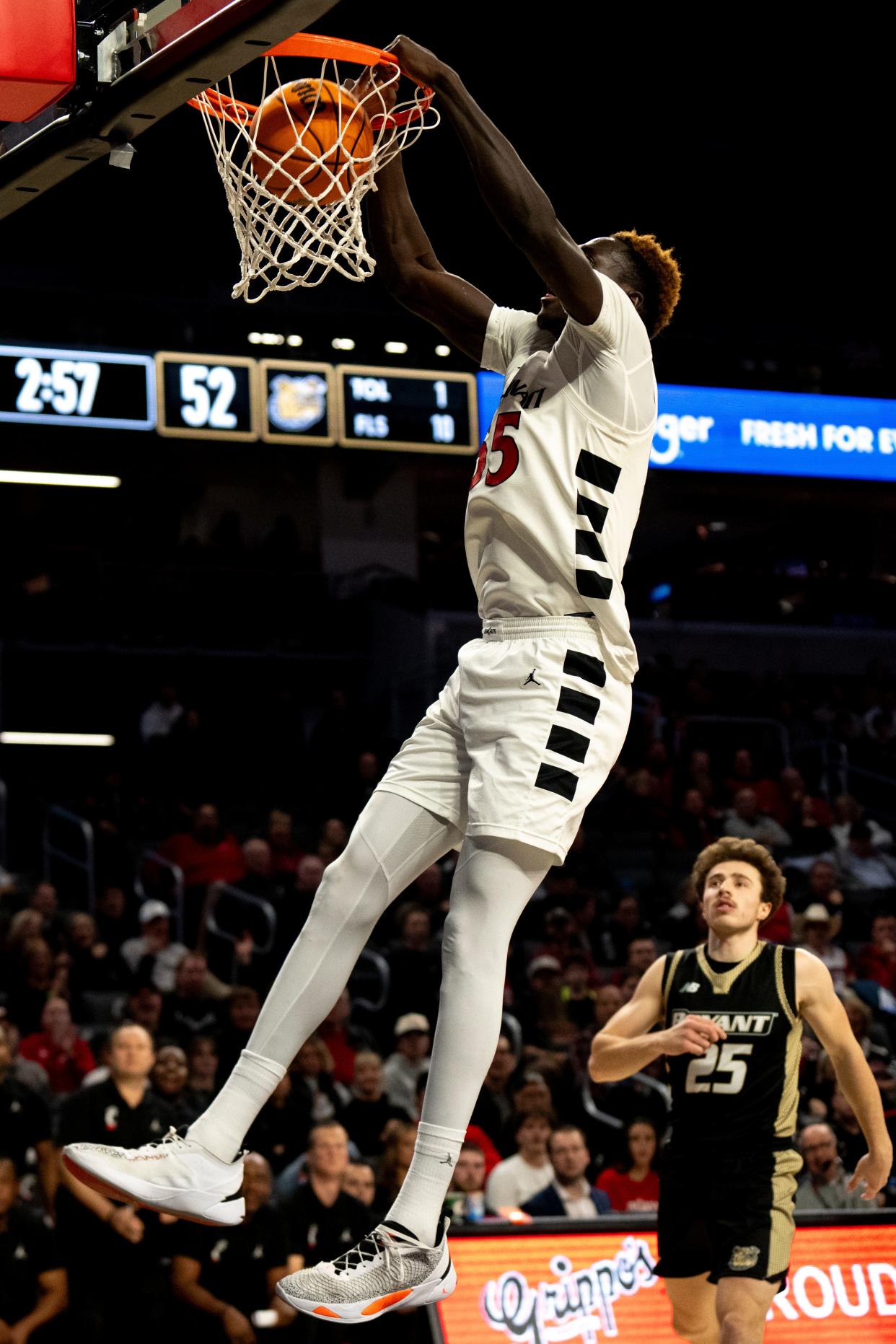 Cincinnati Bearcats forward Aziz Bandaogo (55) dunks in Tuesday's 85-53 win over Bryant at Fifth Third Arena.