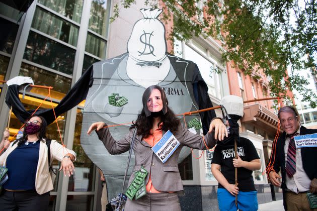 Progressive protesters in Washington, D.C., single out Schrader and a handful of other Democrats who voted against advancing a prescription drug price negotiation policy. (Photo: Tom Williams/Getty Images)