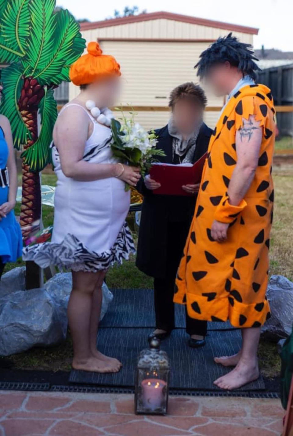 Bride and Groom at a Flintstone themed wedding