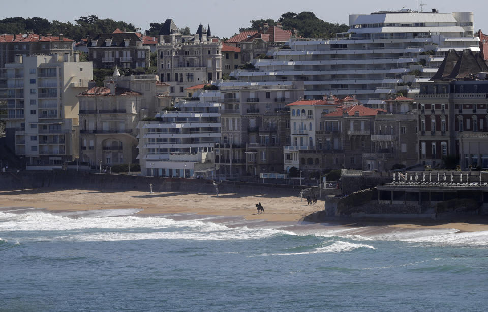 A mounted police officer rides along a deserted beach that falls inside the restricted area as security is stepped-up ahead of the G-7 summit in Biarritz, France Friday, Aug. 23, 2019. U.S. President Donald Trump will join host French President Emmanuel Macron and the leaders of Britain, Germany, Japan, Canada and Italy for the annual G-7 summit in the elegant resort town of Biarritz. (AP Photo/Markus Schreiber)