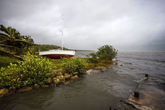 A stranded pleasure boat is pictured in Goyave on September 19, 2017 in the French territory of Guadeloupe, after the passage of Hurricane Maria.