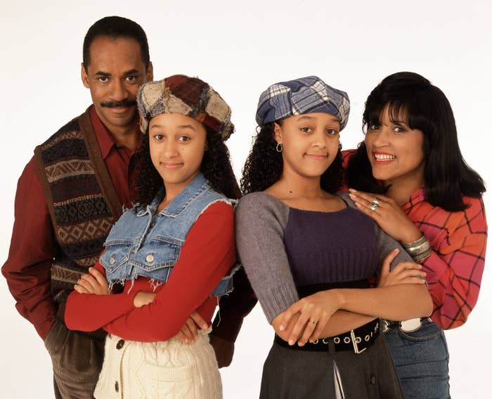 Tim Reid, Tamera Mowry, Tia Mowry, and Jackée Harry pose for a "Sister, SIster" Season 2 promotional photo