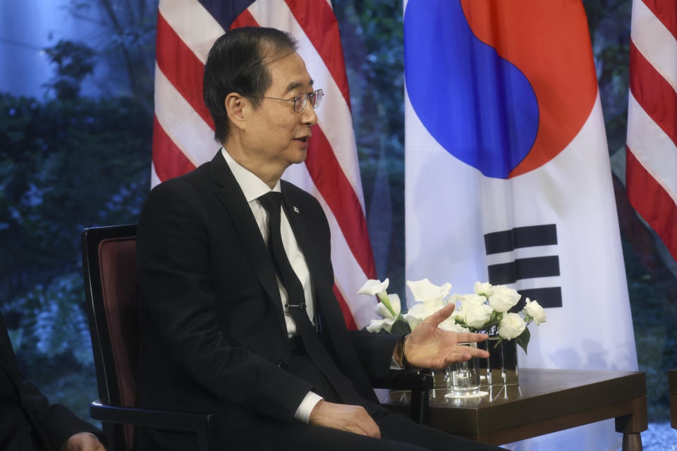 South Korea's Prime Minister Han Duck-soo holds a bilateral meeting with U.S. Vice President Kamala Harris in Tokyo, Tuesday, Sept. 27, 2022. (Leah Millis/Pool Photo via AP)