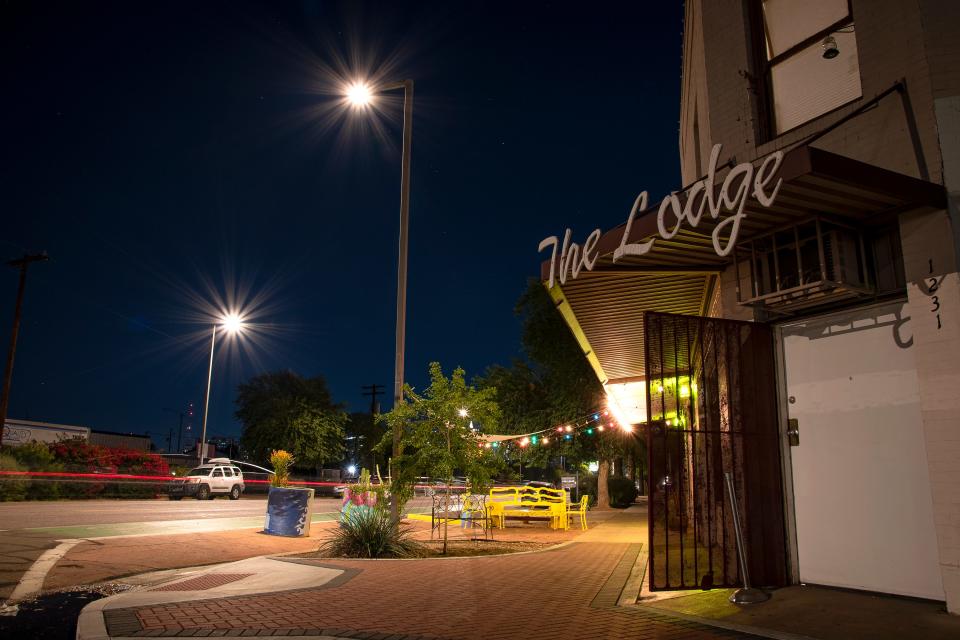 An exterior night view of The Lodge Art Studio in Phoenix on Dec. 15, 2021.