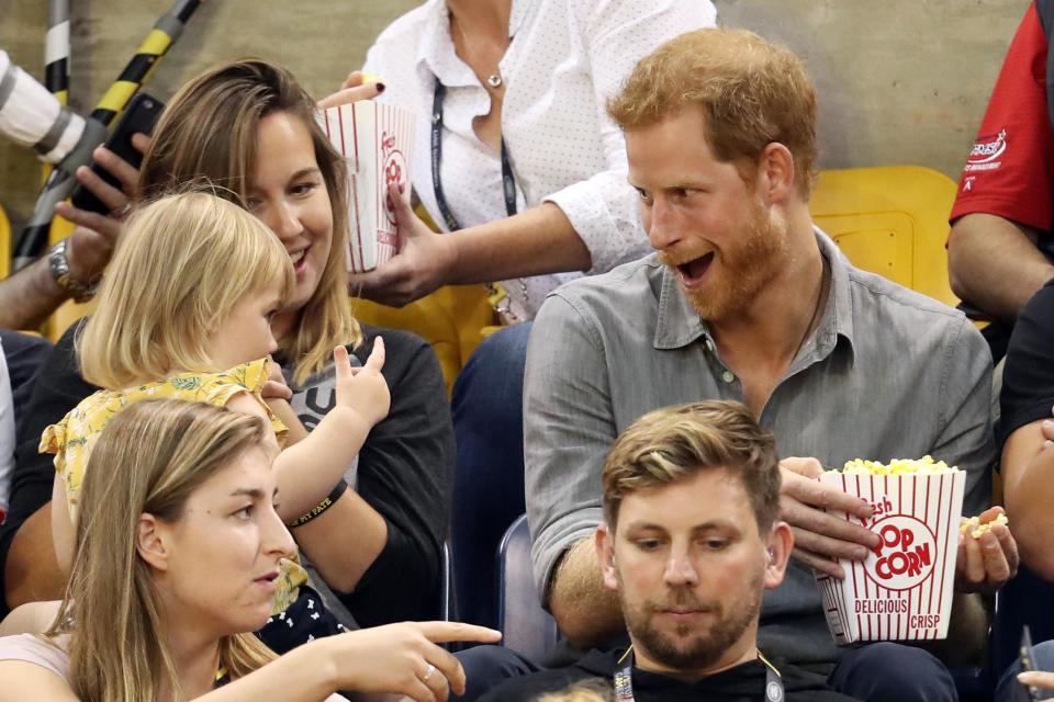 <p>Kissed him on the cheek<br>Sat on his lap<br>Stole his popcorn<br>Threw popcorn at him</p>